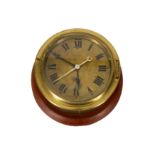 An early 20th century brass ships clock