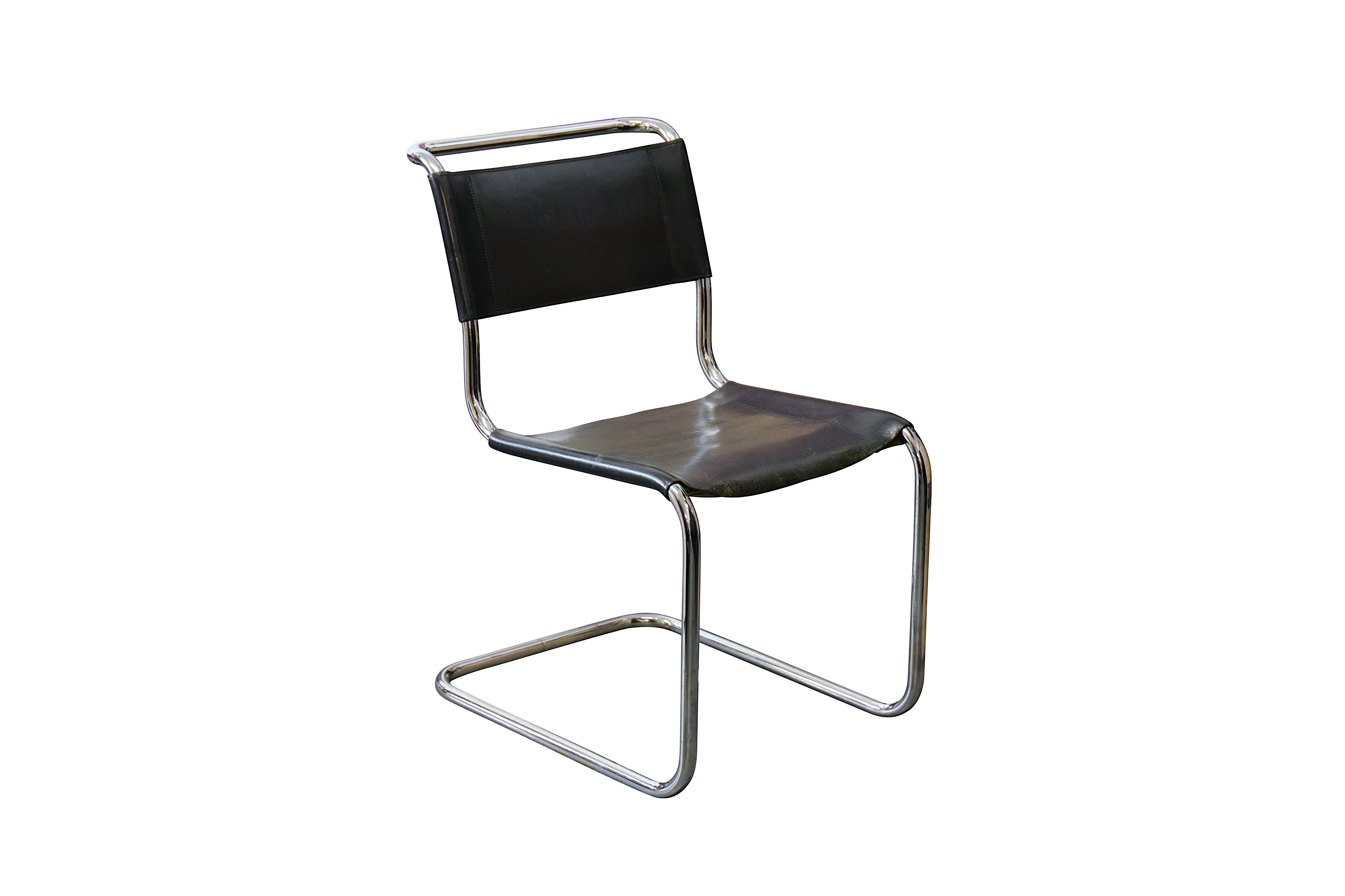 A Thonet Mart Stam S 33 black leather upholstered tubular steel cantilever dining chair