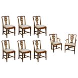 A set of eight James Shoolbred & Co Chippendale style walnut dining chairs