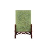 A Chinese pale celadon jade rectangular 'dragon' table screen.