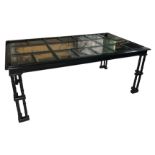 A circa 1970's black lacquered dining table