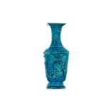 A Chinese moulded turquoise glazed vase.