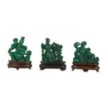 Three Chinese malachite 'ladies' carvings.