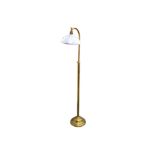 A Christopher Wray Victorian style adjustable brass standard lamp