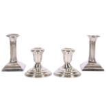 A pair of American sterling silver dwarf candlesticks