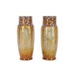 A pair of Art Nouveau Royal Doulton stoneware vases