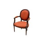 A 19th Century Louis XVI style walnut fauteuil armchair