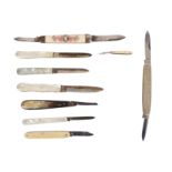 A group of three mother of pearl silver bladed folding fruit knives,