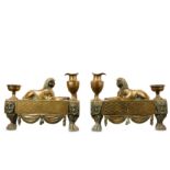 A pair of early 19th century Regency bronze chenets castwith sphinxes, in the style of Thomas Hope