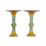 A pair of Chinese famlle verte yellow ground vases, gu.