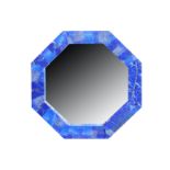 A contemporary octagonal lapis lazuli veneered wall mirror