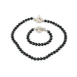 An onyx bead necklace and bracelet suite, by Tiffany & Co.