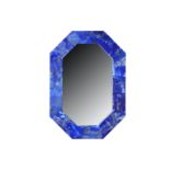 A contemporary lapis lazuli veneered wall mirror