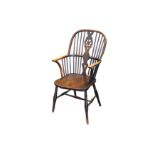 A 19th century Thames Valley wheel back Windsor armchair