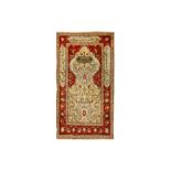 AN EXTREMELY FINE SILK & METAL THREAD HEREKE PRAYER RUG, TURKEY