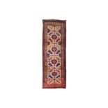 AN ANTIQUE KURDISH LONG RUG