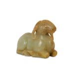 A CHINESE PALE CELADON JADE CARVING OF A RAM.