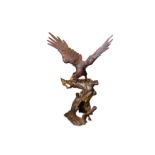 A VERY LARGE BRONZED METAL MODEL OF AN EAGLE