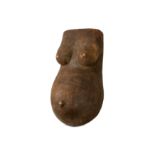 AN AFRICAN CARVED AND PAINTED WOOD FEMALE TORSO