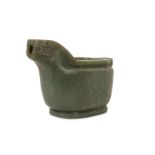 A CHINESE PALE CELADON JADE ARCHAISTIC POURING VESSEL.