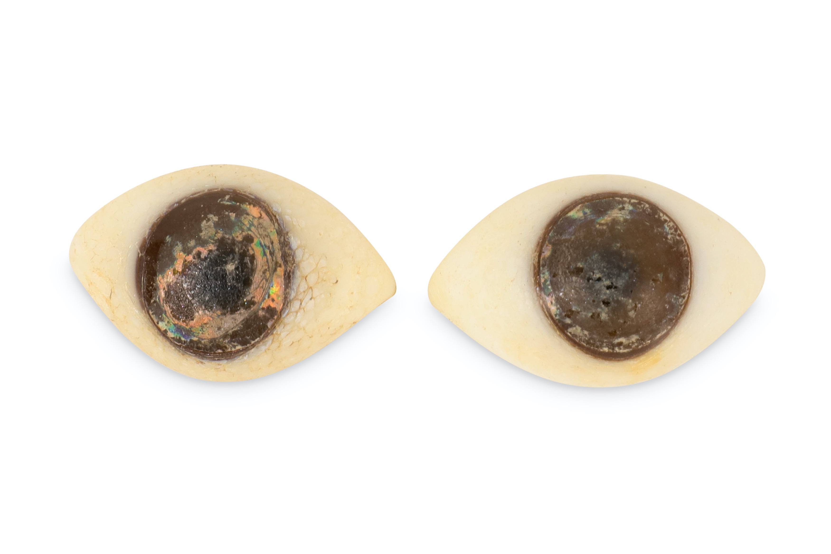 A PAIR OF GLASS EYES, POSSIBLY ANCIENT