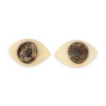 A PAIR OF GLASS EYES, POSSIBLY ANCIENT