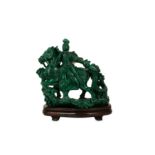 A CHINESE MALACHITE CARVING OF A WARRIOR.
