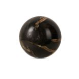 A SOLID FOSSILISED WOOD SPHERE