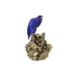 AN IMPRESSIVE CARVED LAPIS LAZULI AND PYRITE FALCON FIGURE