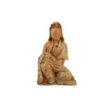 A CHINESE SOAPSTONE FIGURE OF GUANYIN.