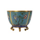 A CHINESE CLOISONNÉ ENAMEL QUATREFOIL 'BLOSSOMS' JARDINIÈRE.