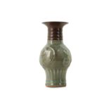 A CHINESE LONGQUAN CELADON MOULDED VASE.