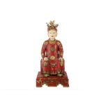 A VIETNAMESE LACQUERED WOOD FIGURE.