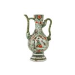 A CHINESE FAMILLE VERTE 'IMMORTALS' EWER.