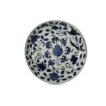 A CHINESE BLUE AND WHITE 'LOTUS SCROLL' DISH.