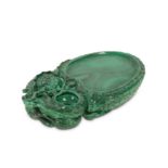 A CHINESE MALACHITE 'LYCHEE' INKSTONE.