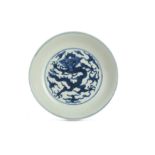 A CHINESE BLUE AND WHITE 'DRAGON' DISH.