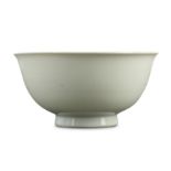 A CHINESE ANHUA-DECORATED WHITE-GLAZED 'DRAGON' BOWL.