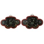 A PAIR OF CHINESE LACQUER HARDSTONE-INLAID QUATREFOIL PANELS.