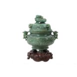 A CHINESE GREEN HARDSTONE INCENSE BURNER AND COVER.