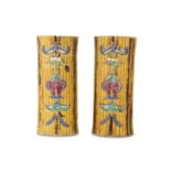 A PAIR OF CHINESE FAMILLE ROSE 'BAMBOO AND CHIMES' HAT STANDS.