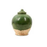 A CHINESE POTTERY GREEN-GLAZED JAR AND COVER.