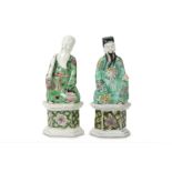 A PAIR OF CHINESE FAMILLE VERTE FIGURES OF IMMORTALS.