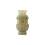 A CHINESE PALE CELADON JADE ARCHAISTIC VASE, HU.