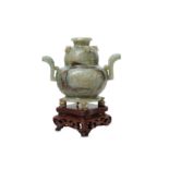A CHINESE PALE CELADON JADE INCENSE BURNER AND COVER.