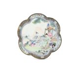 A CHINESE CANTON ENAMEL FAMILLE ROSE 'GO PLAYERS' DISH.