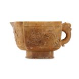 A CHINESE SOAPSTONE ARCHAISTIC 'DRAGON' POURING VESSEL.
