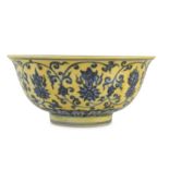 A CHINESE BLUE AND WHITE YELLOW-GROUND 'BAJIXIANG' BOWL.