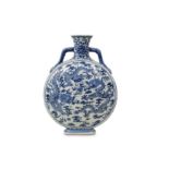 A CHINESE BLUE AND WHITE 'DRAGON' MOON FLASK.