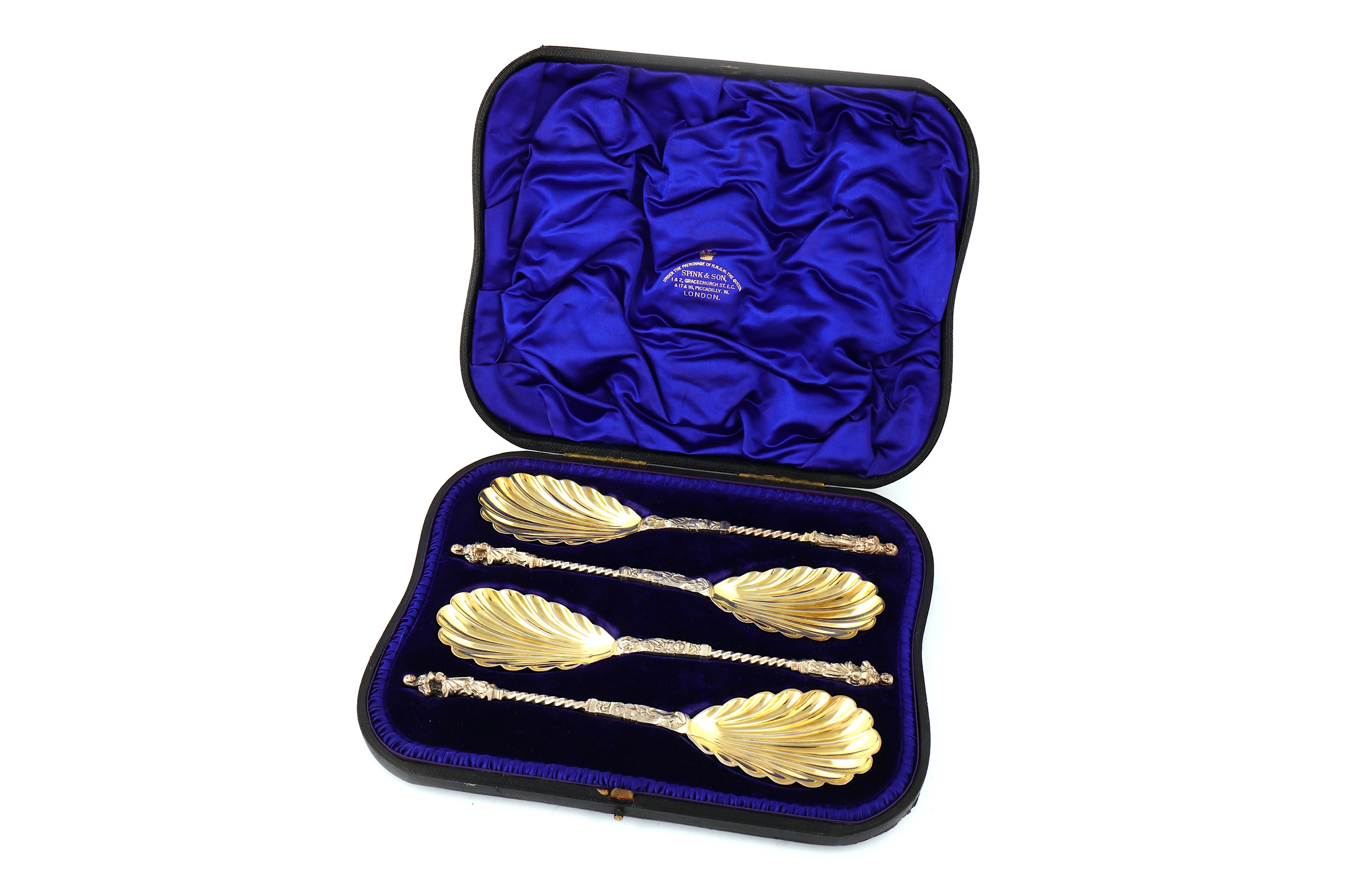 A set of four Victorian parcel-gilt sterling silver apostle spoons